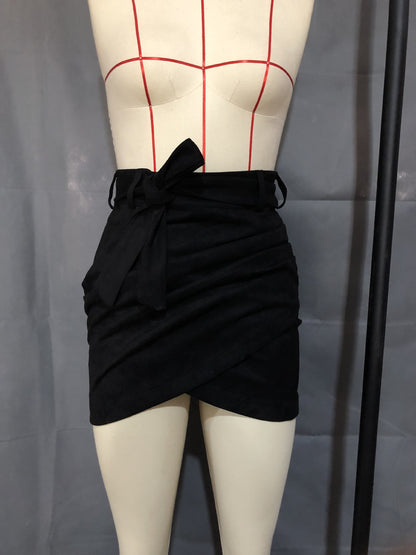 Irregular skirt with leather straps and hips